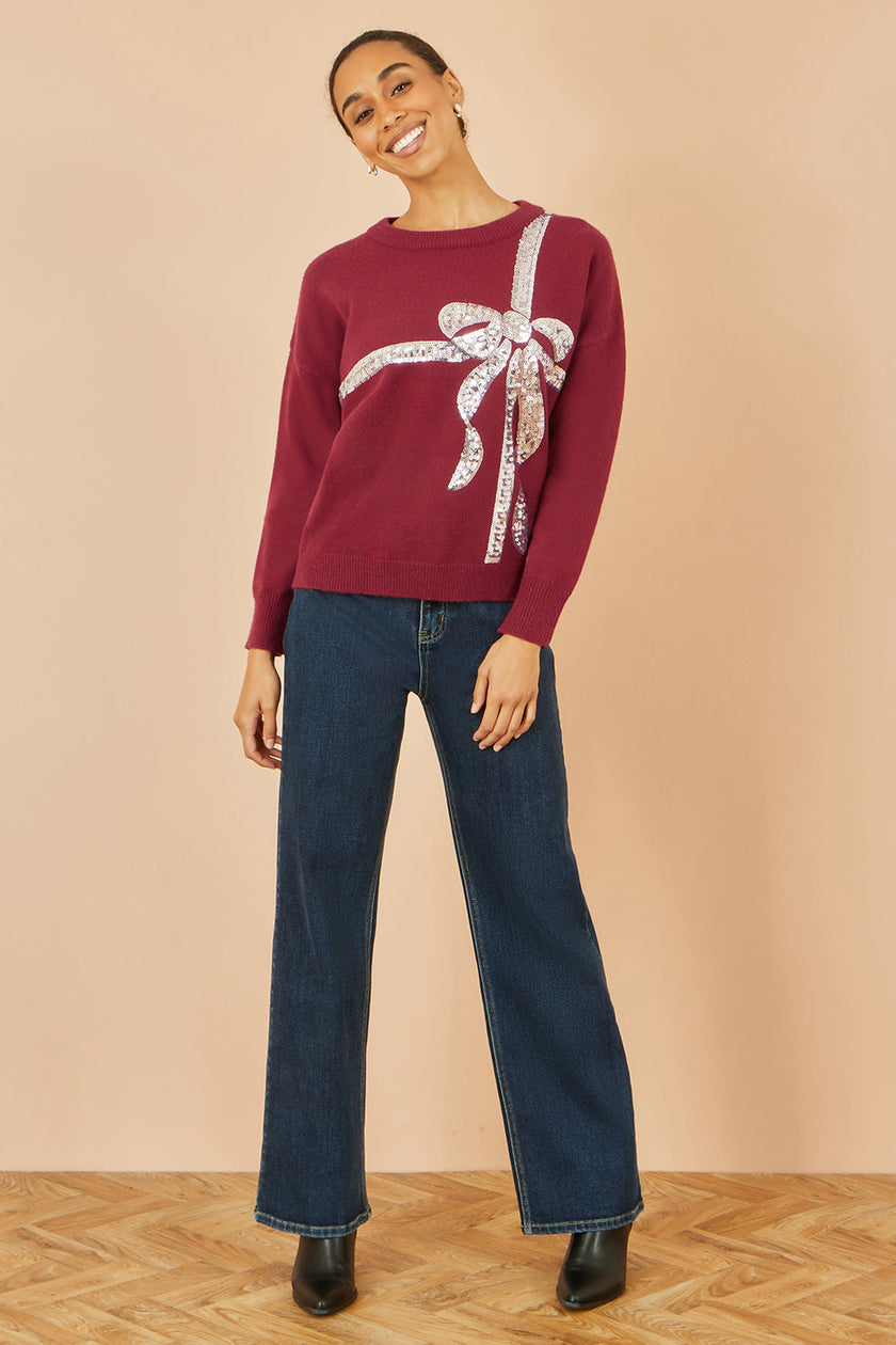 Yumi Strickpullover mit bordeauxroter Pailletten-Schleife