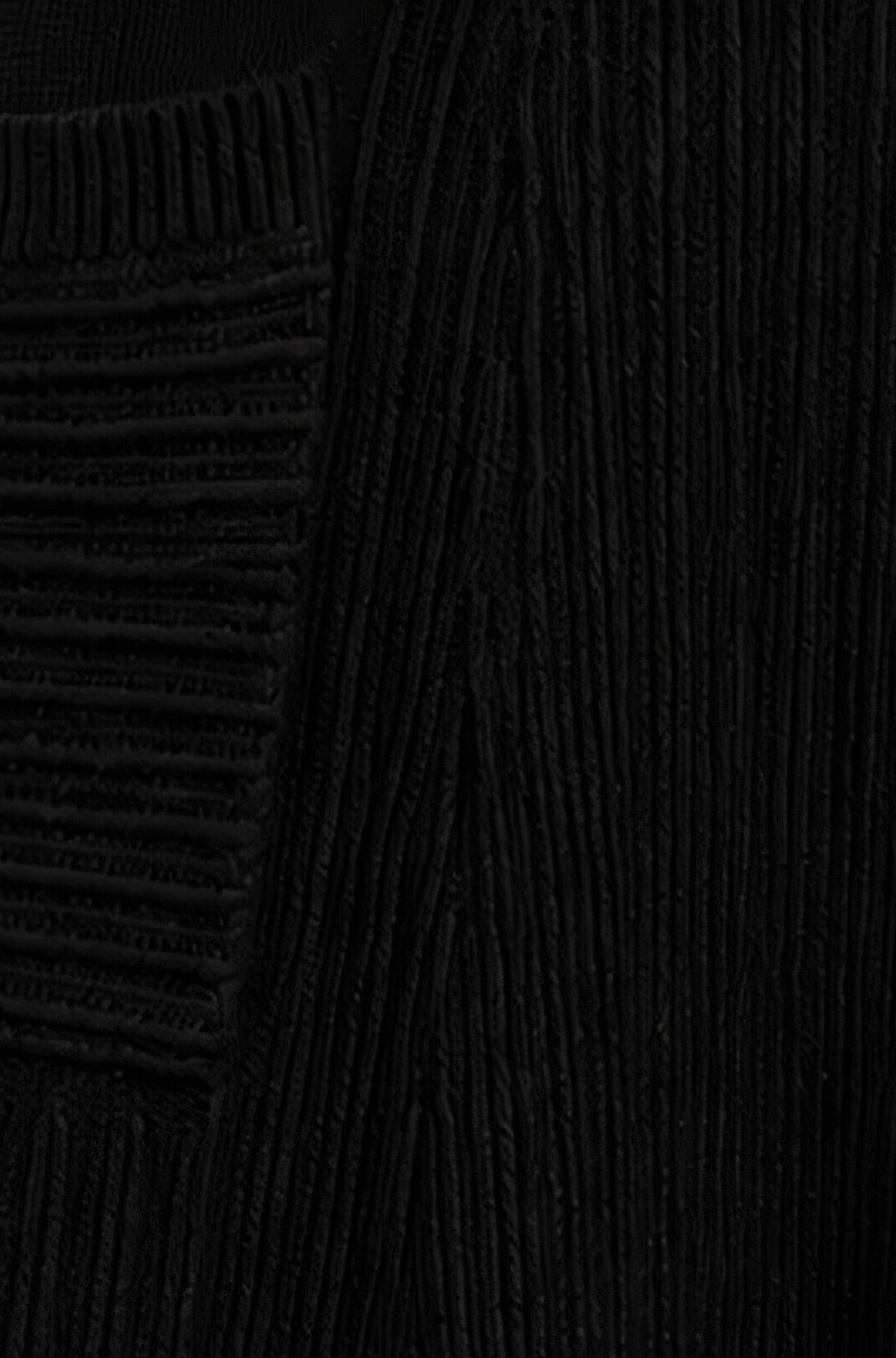 Jupe midi en maille noire avec poches Yumi