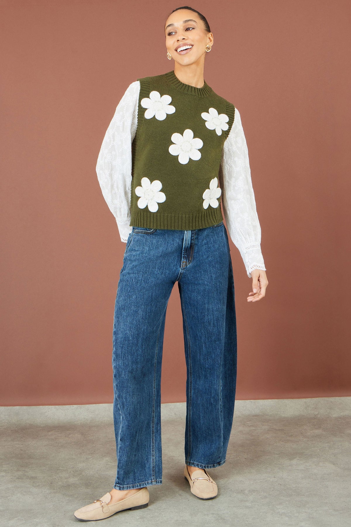 Camiseta de punto sin mangas con aplique de flor verde de Yumi