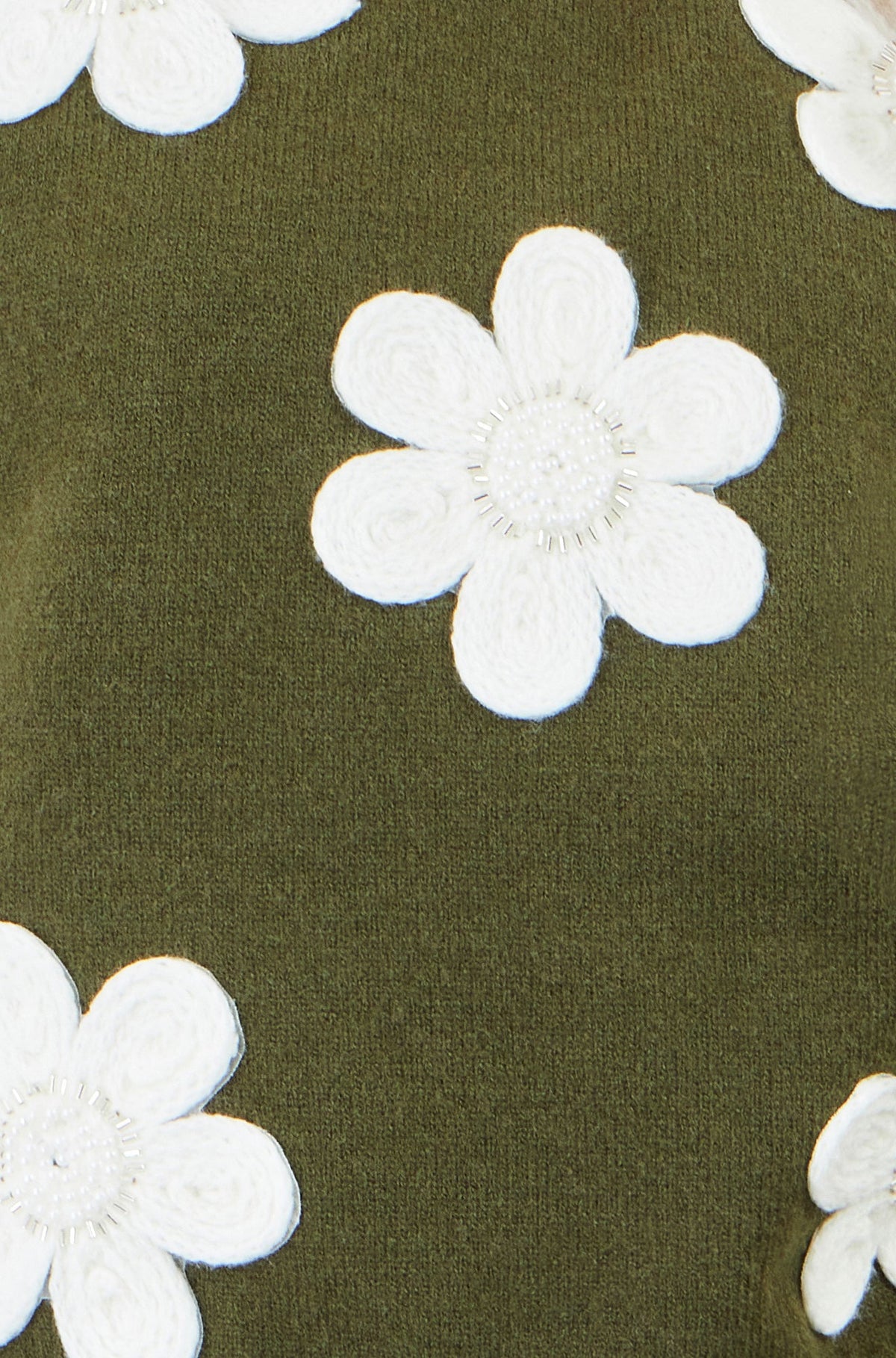 Camiseta de punto sin mangas con aplique de flor verde de Yumi