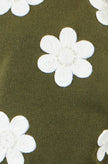 Camiseta de punto sin mangas con aplique de flor verde de Yumi