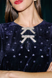 Top Yumi blu navy in velluto a forma di cuore con fiocco