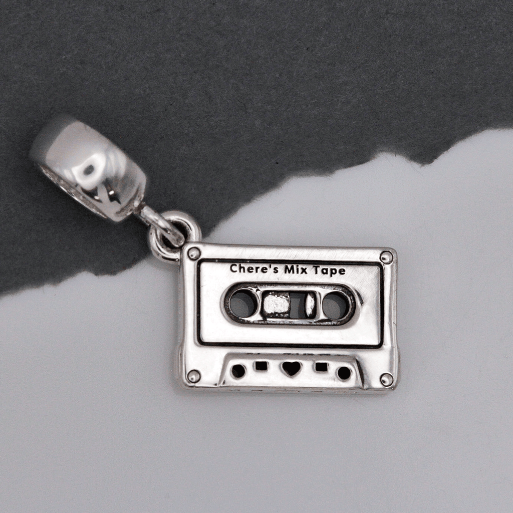 Bedel in de vorm van een cassettebandje