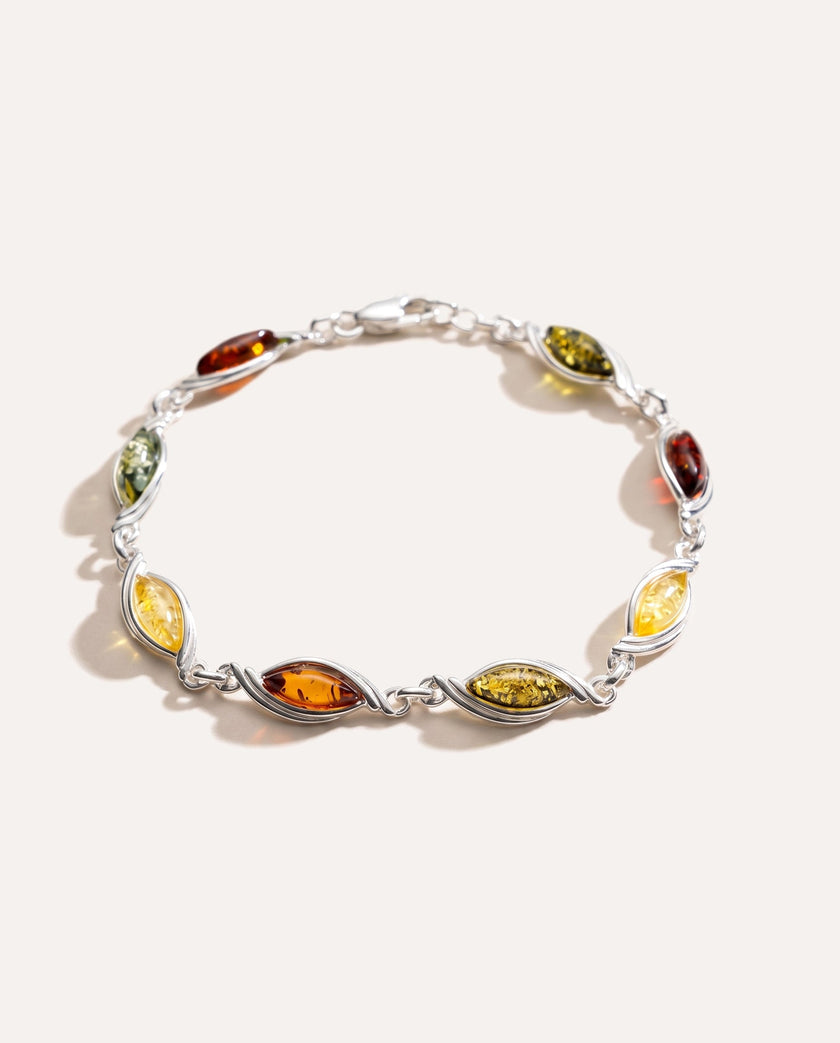 Elegant armbånd med flerfarvede sten