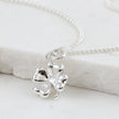 Dije de plata trébol de cuatro hojas