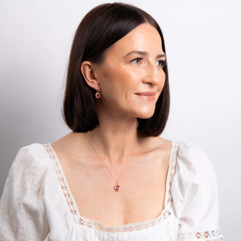Elements Gold Oval Cut Pink Topaz Drop Earrings