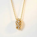 Gold Lyra Necklace with Barnacles and White Topaz