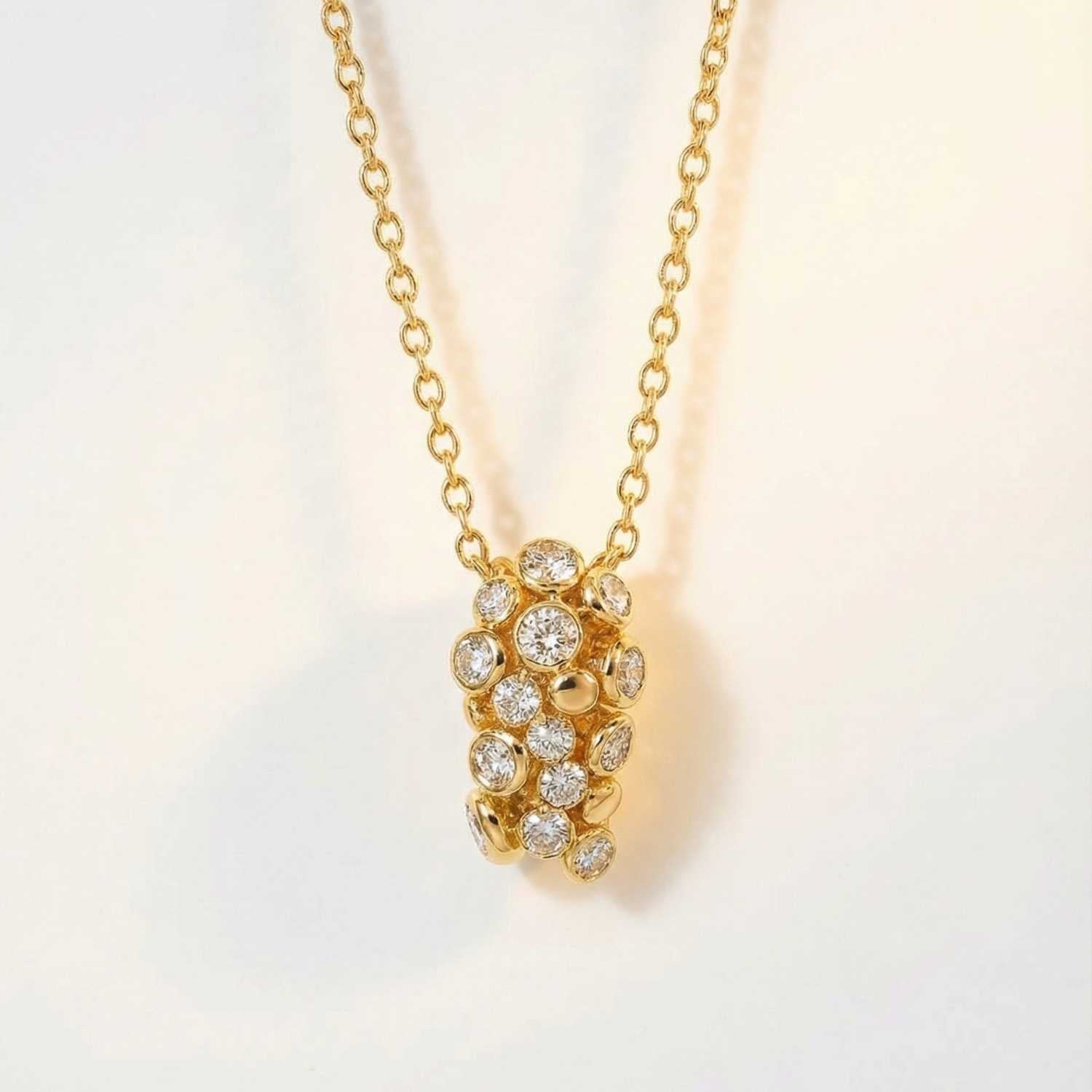 Gold Lyra Necklace with Barnacles and White Topaz