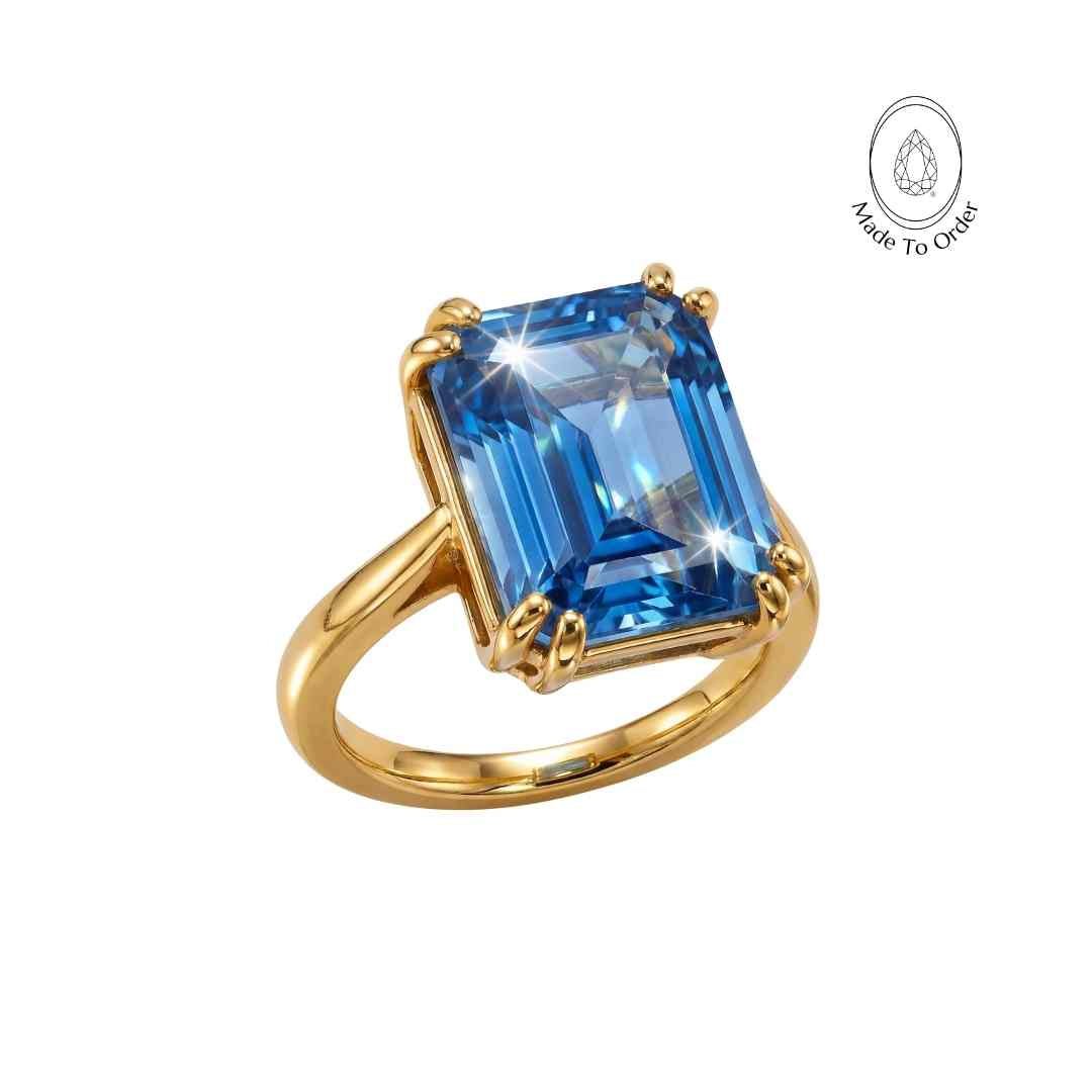 Gold- oder Silberring mit ozeanblauem Topas – Bali