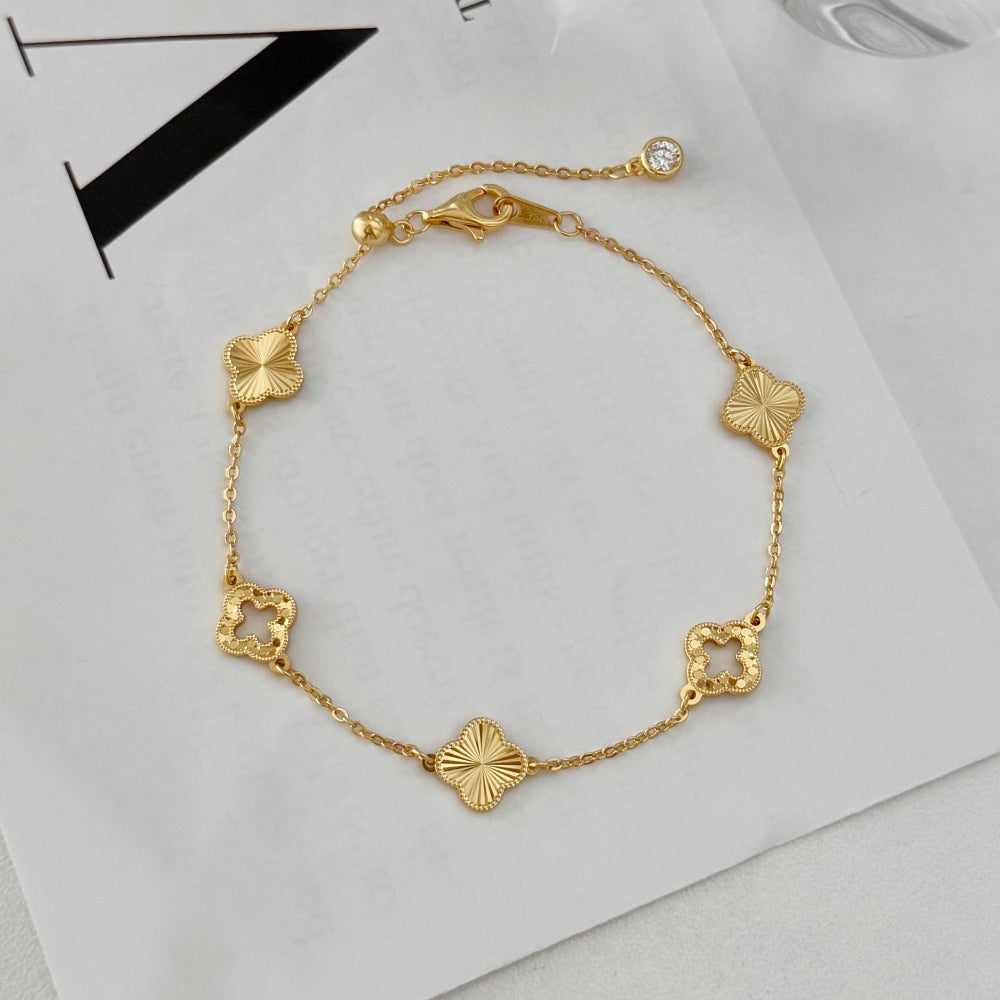 Gold clover cut out bracelet
