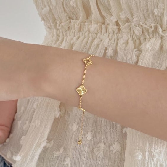 Gold clover cut out bracelet