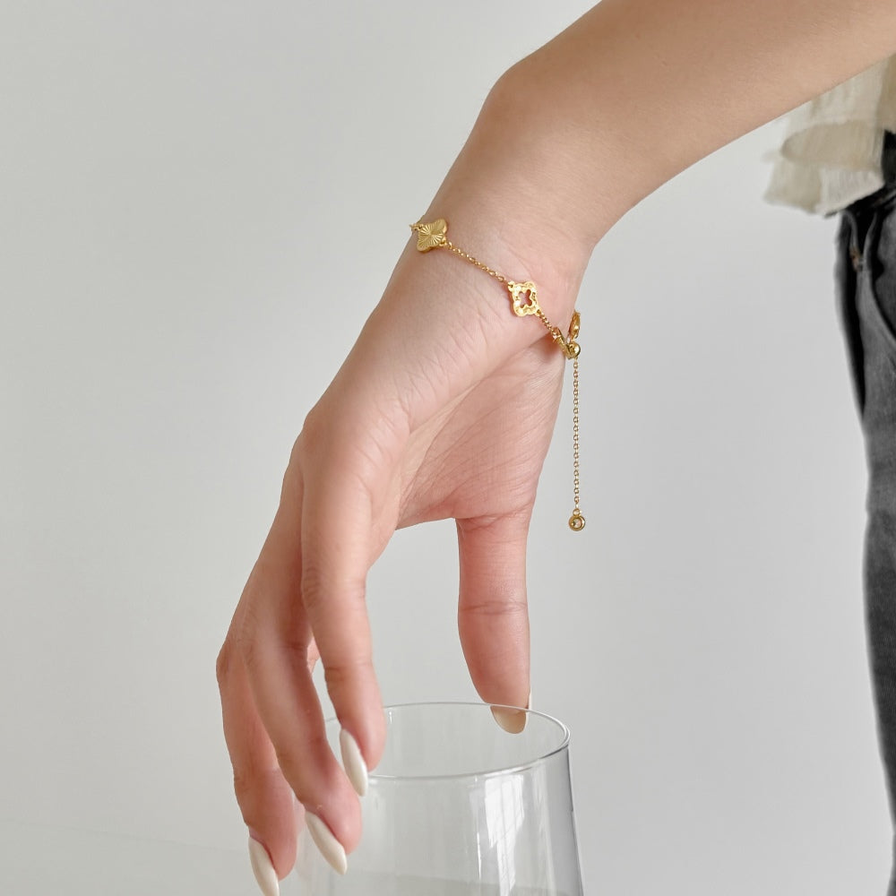 Gold clover cut out bracelet