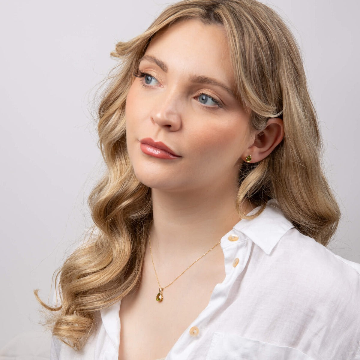 Elements Gold Peridot Teardrop Stud Earrings