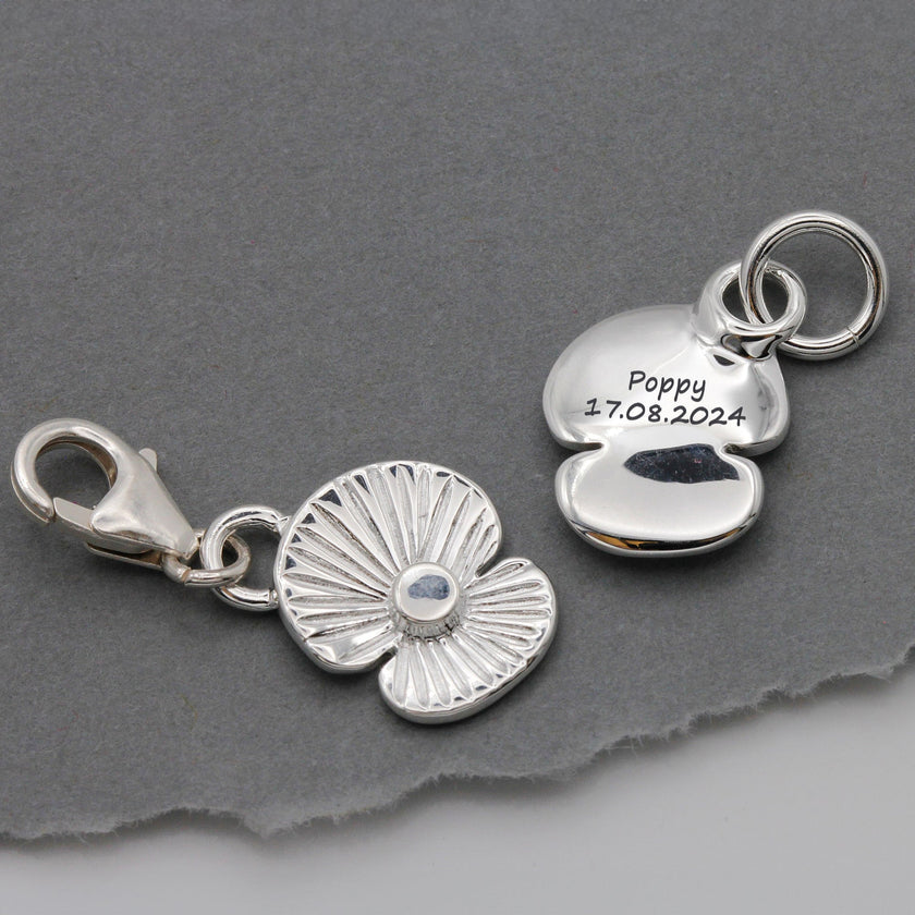 Personlig berlock i silver med vallmo-motiv