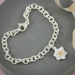 Breloque Fleur de narcisse en argent et or massif
