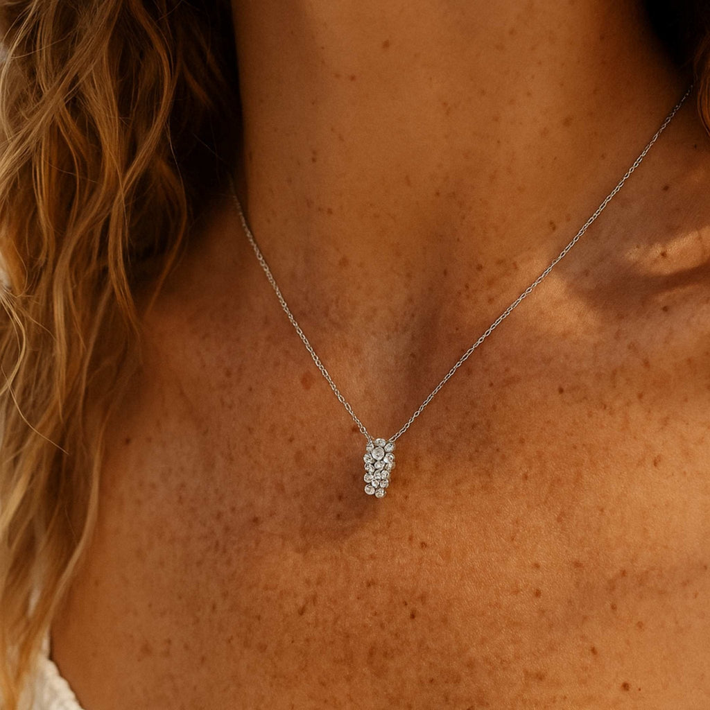 Silver Lyra Necklace with Barnacles and White Topaz