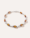 Bracciale a maglie color argento con ambra
