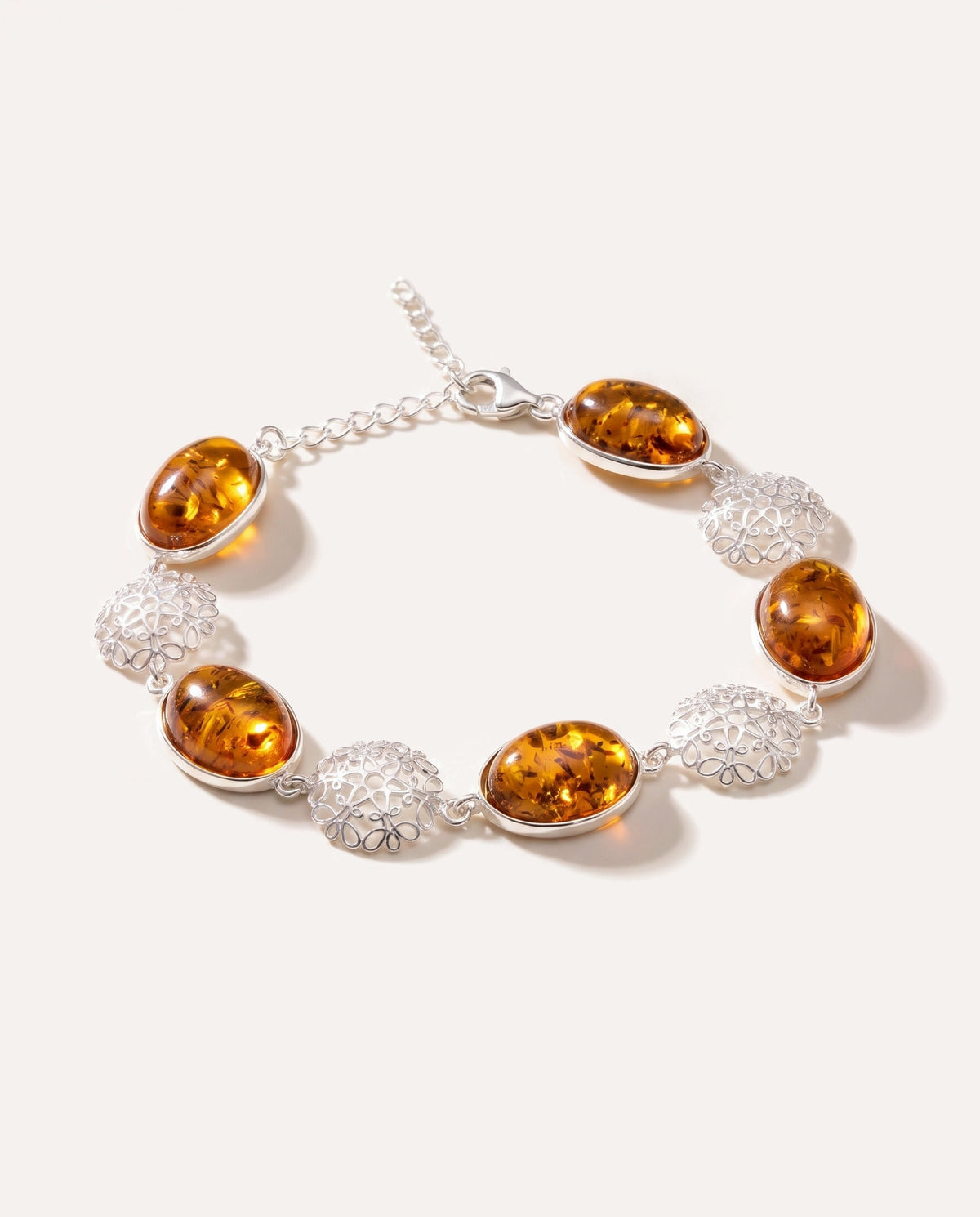 Bracciale a dichiarazione in ambra con filigrana alternata